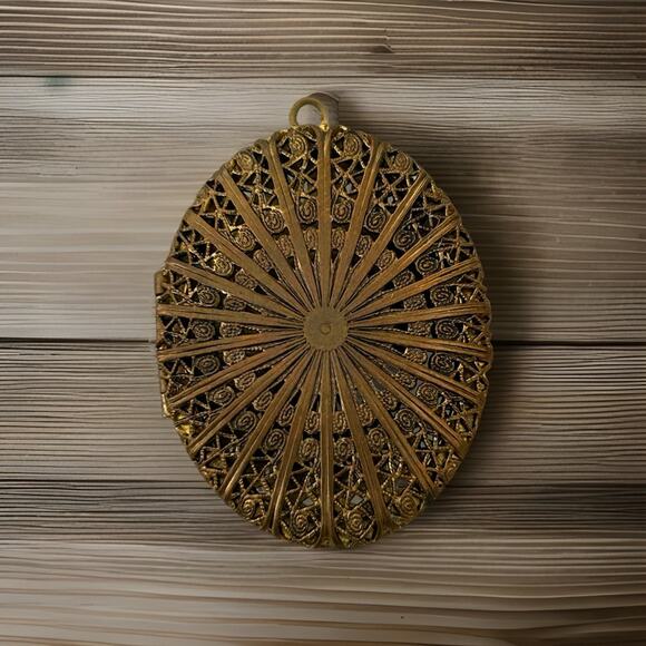 Beautiful Brass Filigree Locket. Measures 1.25” - Picture 1 of 3